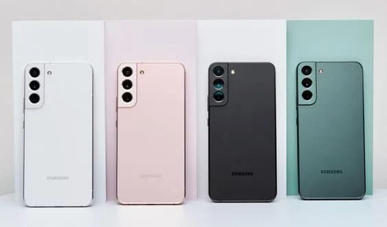 A row of Samsung Galaxy smartphones in white, pink, black and green